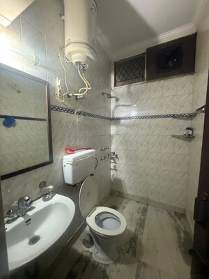 Bathroom in 2 BHK Builder Floor at Kalkaji – for Rent