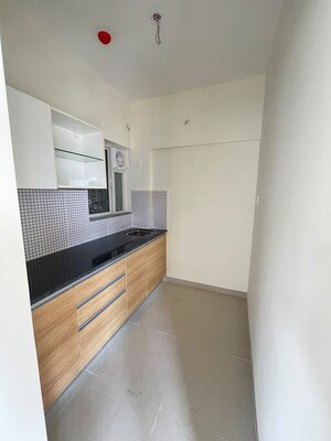 Kitchen in 2 BHK Apartment at Omkar Signet, Malad East – for Rent