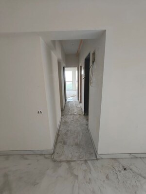 Building Lobby in 2 BHK Apartment at VKG Amazon, Andheri East – for Rent