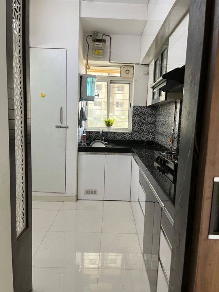 Kitchen, lodha-amara 1.5 Bedroom 539 Sq.Ft. Apartment In Kolshet Road Thane 10746618