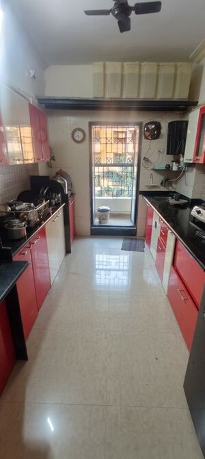 Kitchen in 3 BHK Apartment at Wadhwa Meadows, Khadakpada – for Sale