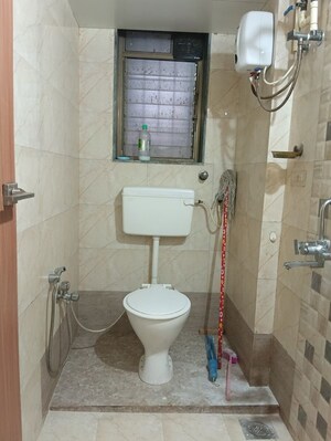 Bathroom in 2 BHK Apartment at Siddharth Palace, Malad West – for Rent