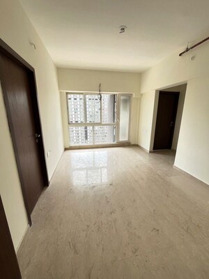 Room in 2 BHK Apartment at Omkar Signet, Malad East – for Rent
