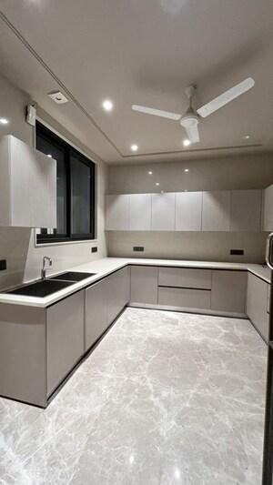 Kitchen in 4 BHK Builder Floor at Kailash Colony – for Sale