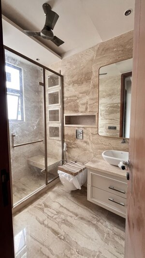 Bathroom in 4 BHK Builder Floor at Kailash Colony – for Sale