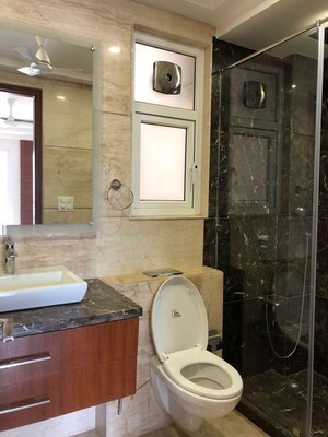 Bathroom in 4 BHK Builder Floor at Kailash Colony – for Sale