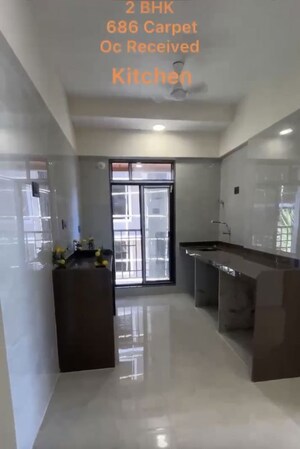 Living Room in 2 BHK Apartment at Aadhunik Madhumas CHS, Borivali West – for Rent