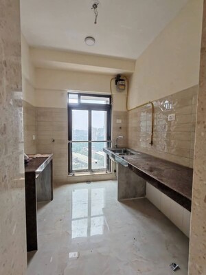 Kitchen in 2 BHK Apartment at Group Satellite Elegance, Goregaon East – for Rent