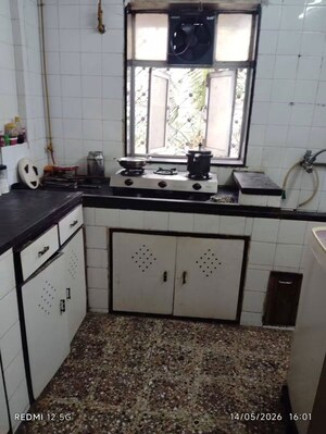 Kitchen in 1 BHK Apartment at Juhu Gulmohar CHS, Vile Parle West – for Sale