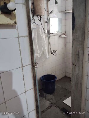 Bathroom in 1 BHK Apartment at Juhu Gulmohar CHS, Vile Parle West – for Sale