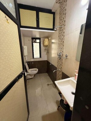 Bathroom in 1 BHK Apartment at Shiv Shankar II CHS, Sanpada – for Rent