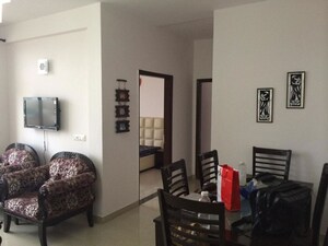Dining area in 2 BHK Apartment at Omaxe Grand, Sector 93b – for Sale