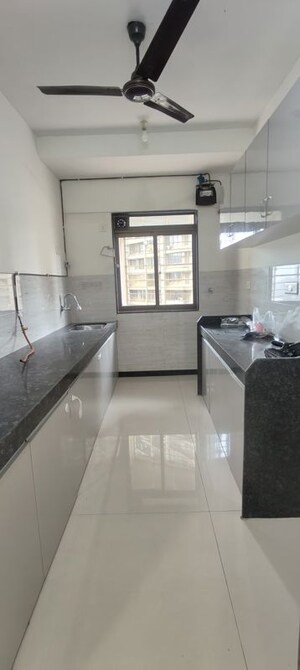 Kitchen in 2 BHK Apartment at Acme Ozone Oakwood and Ashwood, Manpada – for Rent