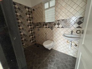 Bathroom in 2 BHK Apartment at ARV Newtown, Pisoli – for Rent