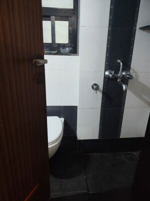 Bathroom in 2 BHK Apartment at Evershine Park, Andheri West – for Rent