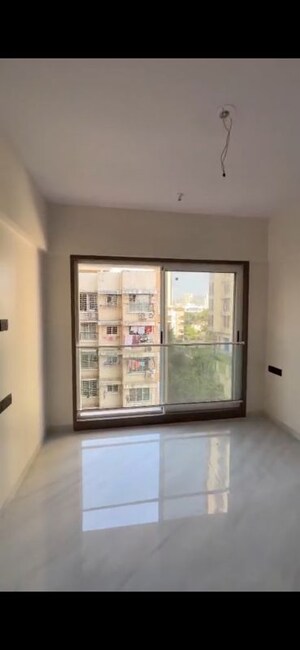 Room in 2 BHK Apartment at Kabra Garnet, Malad West – for Sale