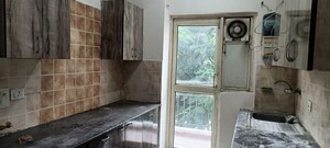 Kitchen in 2 BHK Apartment at Aims Golf Avenue II, Sector 75 – for Rent