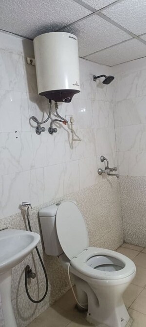 Bathroom in 2 BHK Apartment at Aims Golf Avenue II, Sector 75 – for Rent