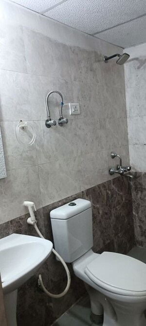 Bathroom in 2 BHK Apartment at Aims Golf Avenue II, Sector 75 – for Rent