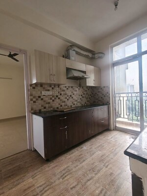 Kitchen in 2 BHK Apartment at Ansal API Celebrity Gardens, Sushant Golf City – for Rent