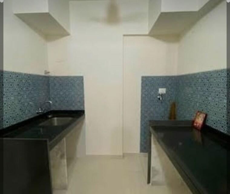 Kitchen, dosti-imperia-phase-i 2 Bedroom 734 Sq.Ft. Apartment In Ghodbunder Road Thane 10747127