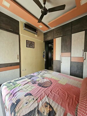 Bedroom in 2 BHK Apartment at Sheth Vasant Lawns, Laxmi Nagar – for Rent