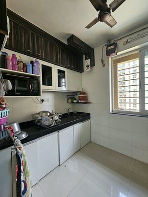 Kitchen in 2 BHK Apartment at Sheth Vasant Lawns, Laxmi Nagar – for Rent