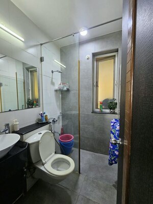 Attached Bathroom in 2 BHK Apartment at Sheth Vasant Lawns, Laxmi Nagar – for Rent