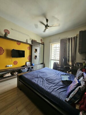 Bedroom in 2 BHK Apartment at Sheth Vasant Lawns, Laxmi Nagar – for Rent