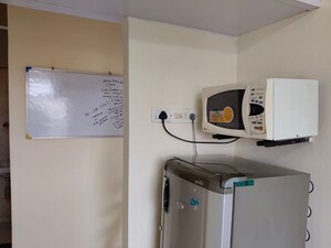 Kitchen in 1 BHK Apartment at Green Acres Apartment, Waghbil – for Rent
