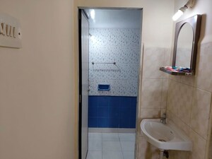 Bathroom in 2 BHK Apartment at Puranik City Phase III, Ghodbunder Road – for Rent