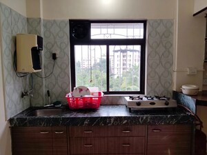 Kitchen in 2 BHK Apartment at Puranik City Phase III, Ghodbunder Road – for Rent