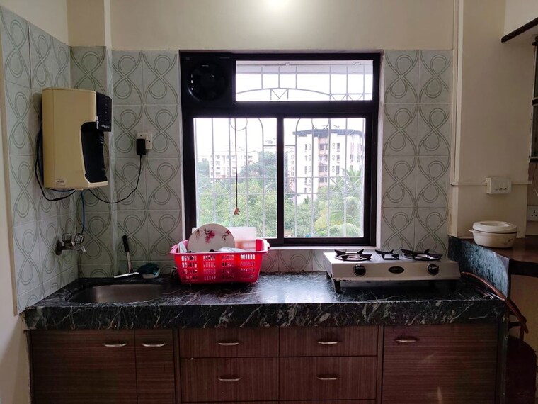 Kitchen, puranik-city-phase-iii 2 Bedroom 591 Sq.Ft. Apartment In Ghodbunder Road Thane 10747255