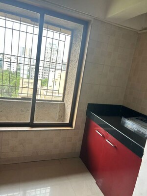 Kitchen in 2 BHK Apartment at Shubharambh Complex, Manpada – for Rent