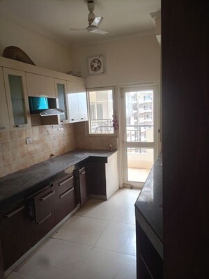 Kitchen in 4 BHK Apartment at AWHO Shanti Vihar, Sector 95 – for Rent