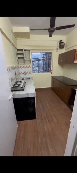 Kitchen in 1 BHK Apartment at Andheri CHS, Andheri West – for Rent