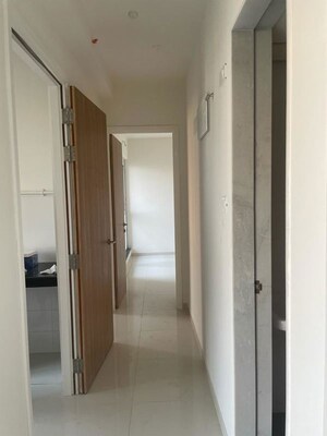Building Lobby in 1.5 BHK Apartment at Godrej Emerald, Ghodbunder Road – for Rent
