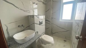 Bathroom in 3 BHK Builder Floor at Ansal Palam Triangle, Palam Vihar Extension – for Rent
