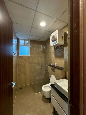 Bathroom in 3 BHK Apartment at Maya Green Lotus Saksham, International Airport Road – for Rent