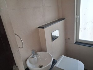 Bathroom in 1 BHK Apartment at Omkar Signet, Malad East – for Rent