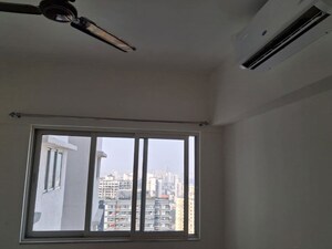 Room in 1 BHK Apartment at Omkar Signet, Malad East – for Rent
