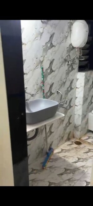 Bathroom in 2 BHK Apartment at Deepankar CGHS, Dadar West – for Rent