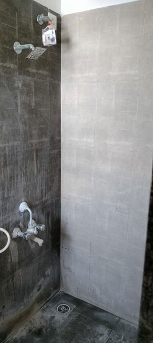 Bathroom in 3 BHK Apartment at Mantra Essence, Undri – for Rent