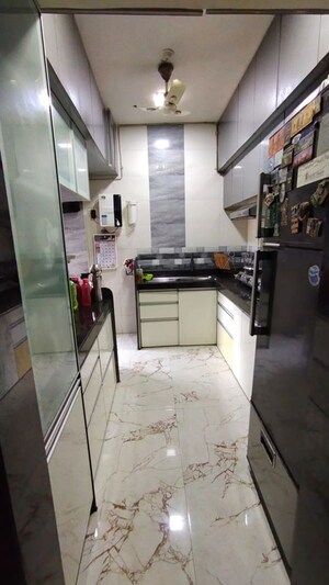 Kitchen in 2 BHK Apartment at Chamunda Heights, Ghansoli – for Rent