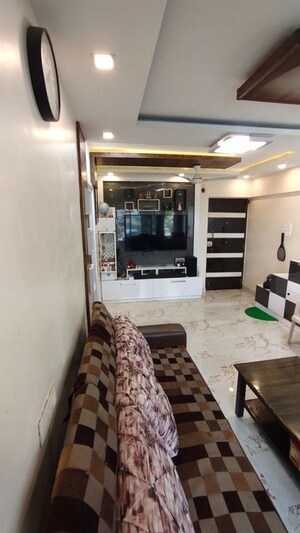Living Room in 2 BHK Apartment at Chamunda Heights, Ghansoli – for Rent