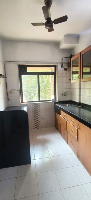 Kitchen in 3 BHK Apartment at Bhoomi Acres, Thane West – for Rent