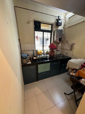 Kitchen in 1 BHK Apartment at Sukh Sakhu Sadan CHS, Kharghar – for Sale