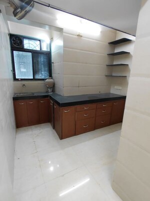 Kitchen in 3 BHK Apartment at Bhakti Niwas CHS Sector 50 Seawoods, Seawoods – for Rent