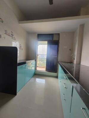 Kitchen in 2 BHK Apartment at Aniruddha Icon, Sector 29 Nerul – for Rent