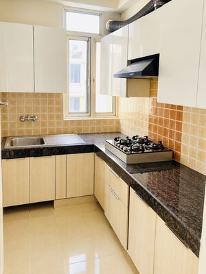 Kitchen in 2 BHK Apartment at Shree Vardhman Mantra, Sector 67 – for Rent
